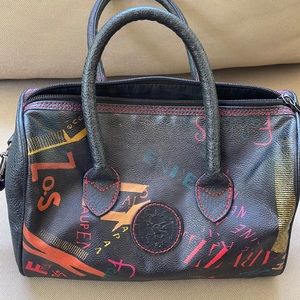 Falchi sport   5.5w x 6l 1 inside pocket.   Minor flaw handle last picture